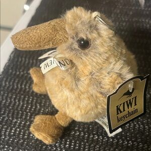 Kiwi Brand Keychain with Brown and Black Design